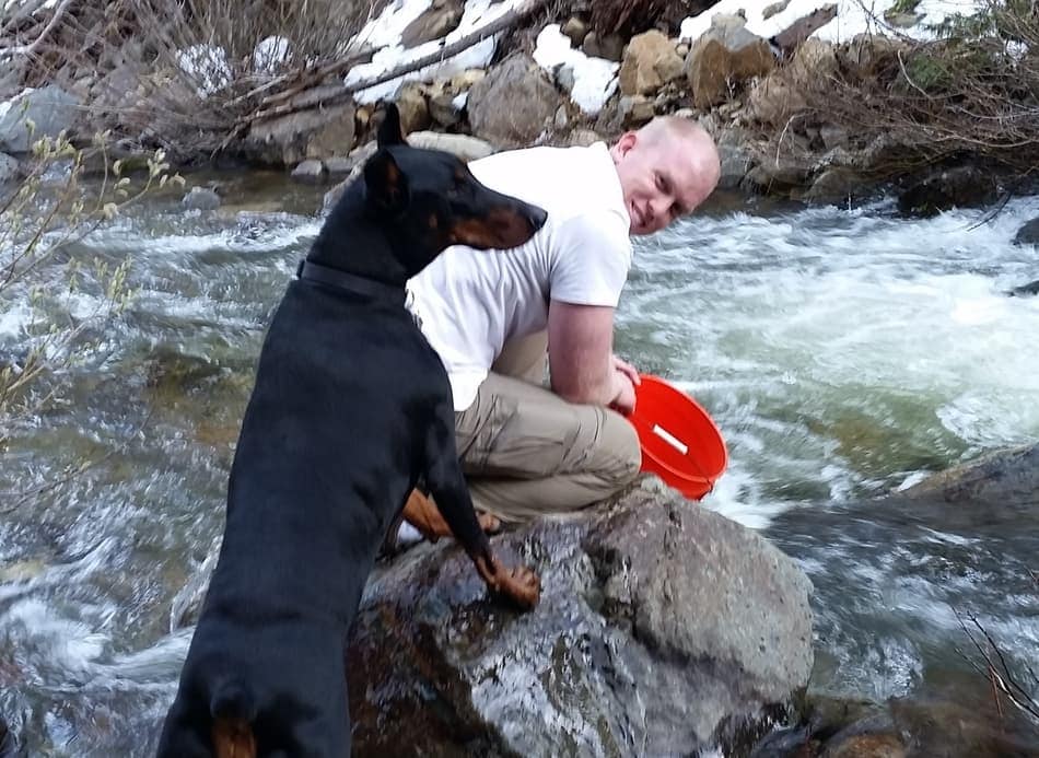 My Doberman right by my side while camping.