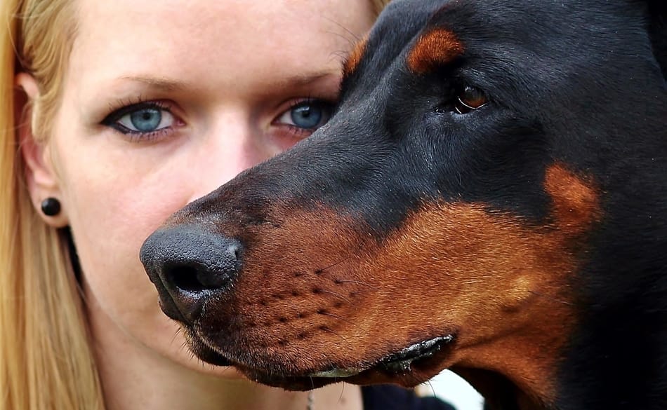 Woman with her guard dog.